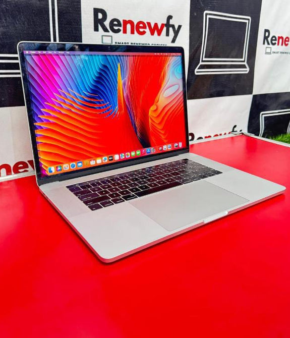 Apple Macbook Pro A1990 Intel Core i7 8th Gen (2018) - (16 GB/256 GB SSD/Mac OS Mojave/4 GB AMD Radeon Graphics) MR932HN/A  (15.4 inch, Space Grey, 1.83 kg) (refurbished, second hand, renewed, preowned, open box)